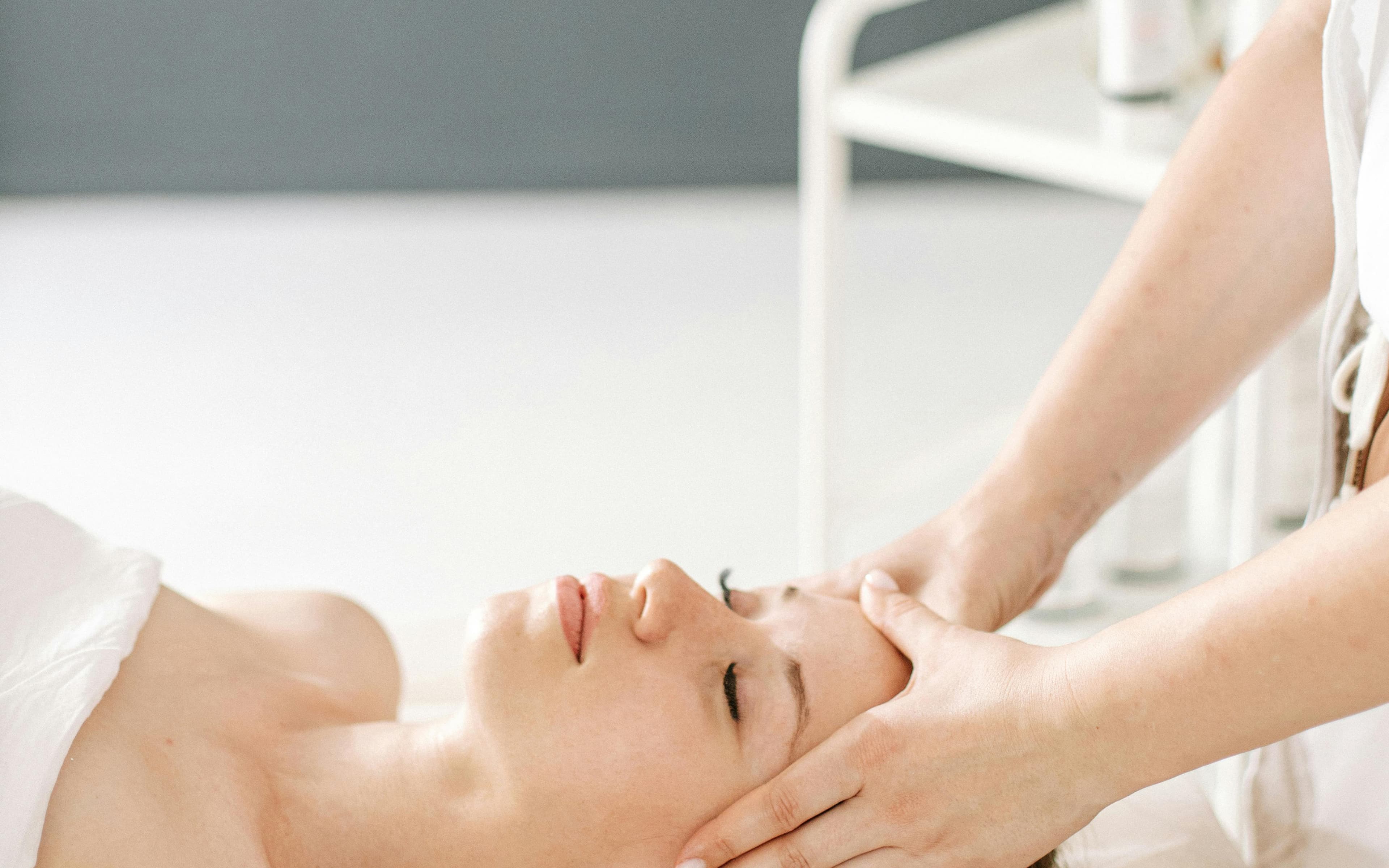 A woman receiving a relaxing massage.