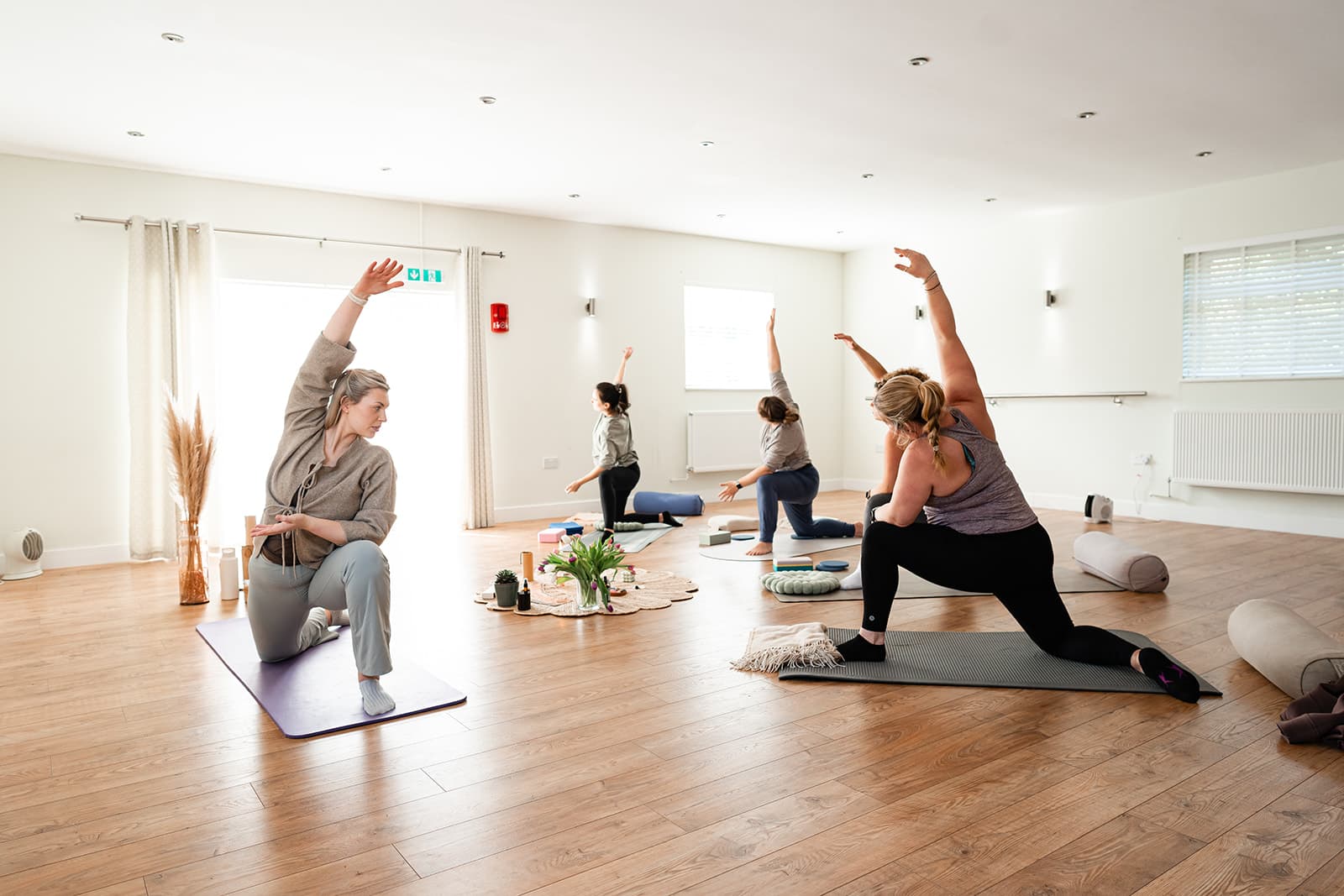 Rosie teaching a yoga class.