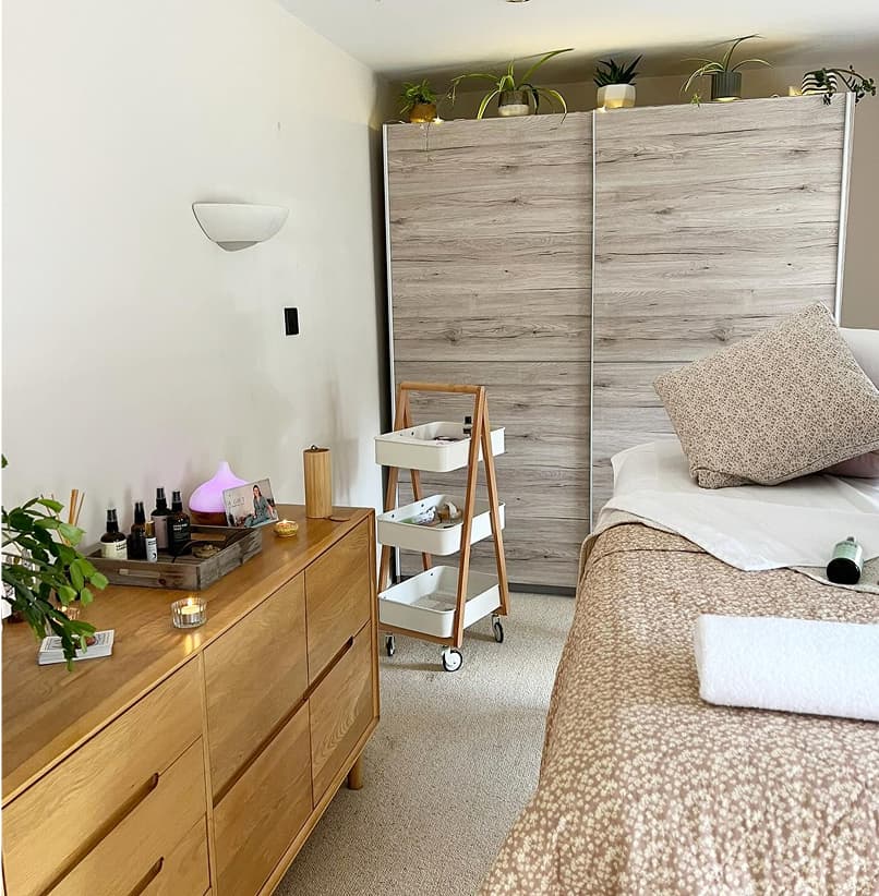 A pregnant woman having a massage while on her side.