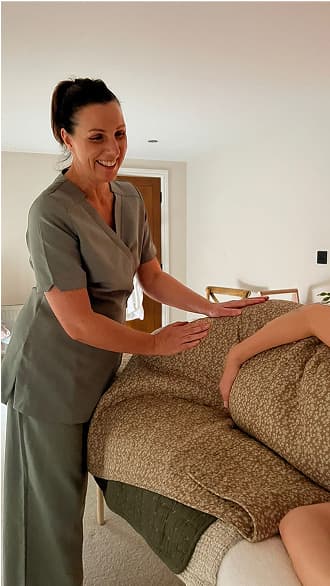 An Instagram post showing Tiffany giving a pregnancy massage.