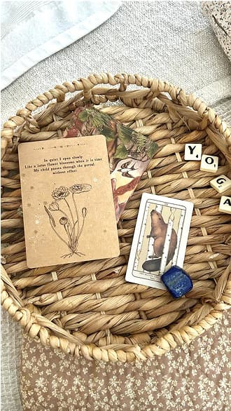 An Instagram post showing a basket of crystals and cards for an upcoming yoga session.