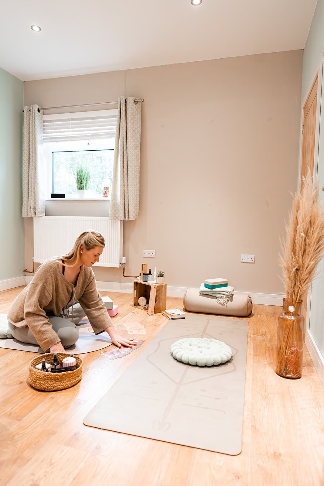 Rosie setting up for a private birth preparation session for a pregnant lady and her birth partner.